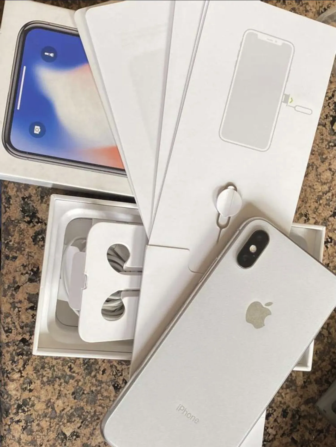 Iphone x 64gb in silver/white - ad image 1