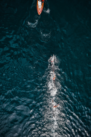 Boat Rowing Vs Swimming People